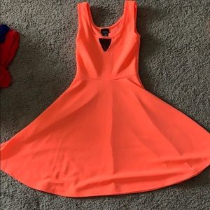 Peach dress with mesh triangle above chest